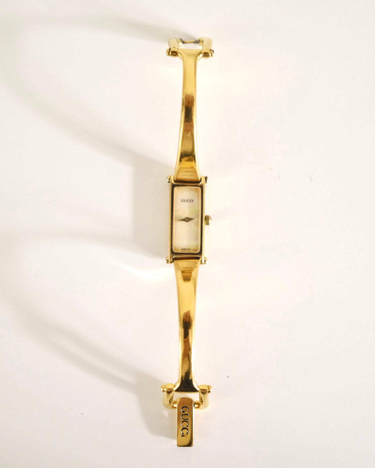 Vintage Gucci 1500L Gold Watch | Mother of Pearl Dial | Elegant Gold Bangle Bracelet | Classic Designer Timepiece
