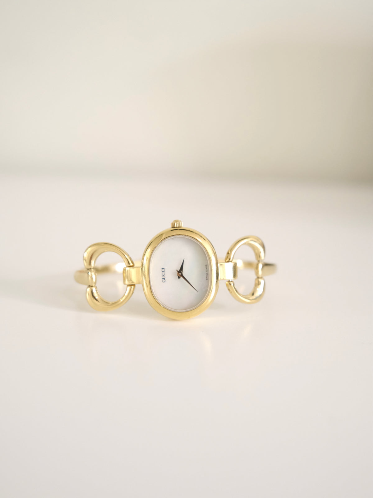Vintage Gucci 1600L Gold Watch | White Dial | Elegant Gold Bangle Bracelet | Classic Swiss Designer Timepiece