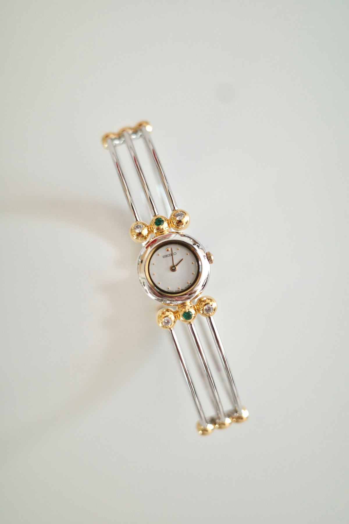 Vintage Seiko Emerald Crystal Bangle Watch | Gold & Silver Two-Tone Women’s Bracelet Watch