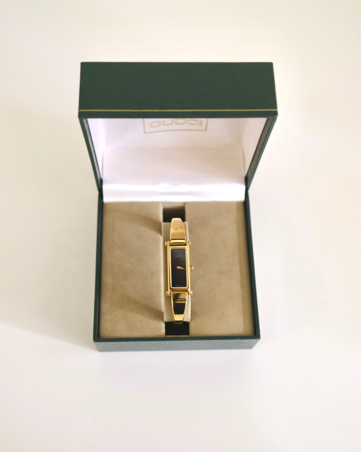 Vintage Gucci 1500L Gold Watch | Black Dial | Elegant Gold Bangle Bracelet | Classic Designer Timepiece