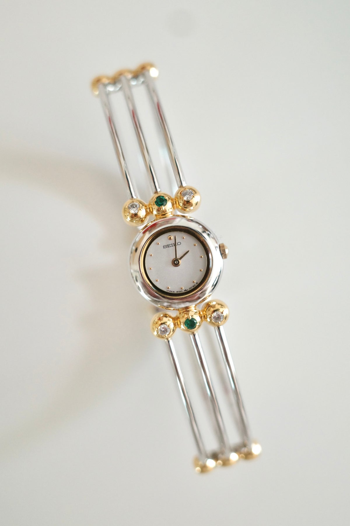Vintage Seiko Emerald Crystal Bangle Watch | Gold & Silver Two-Tone Women’s Bracelet Watch