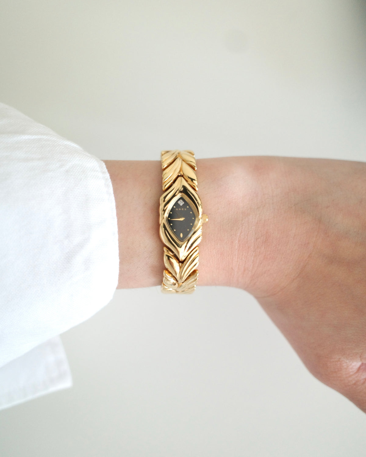 Rare Vintage Grès Gold-Tone Bracelet Watch – Black Dial & Diamond Detail