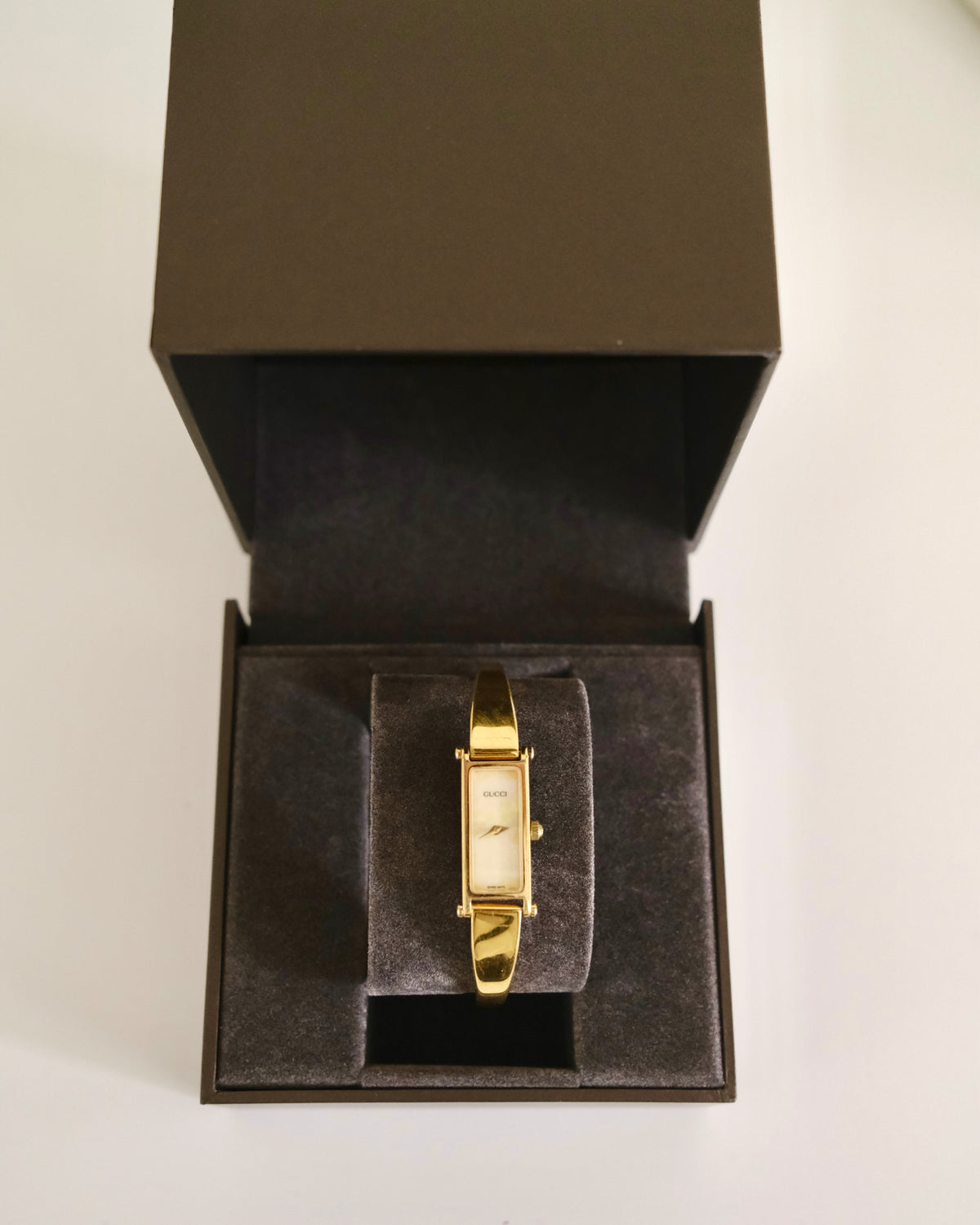 Vintage Gucci 1500L Gold Watch | Mother of Pearl Dial | Elegant Gold Bangle Bracelet | Classic Designer Timepiece