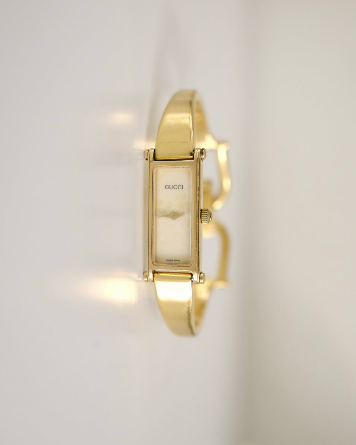 Vintage Gucci 1500L Gold Watch | Mother of Pearl Dial | Elegant Gold Bangle Bracelet | Classic Designer Timepiece
