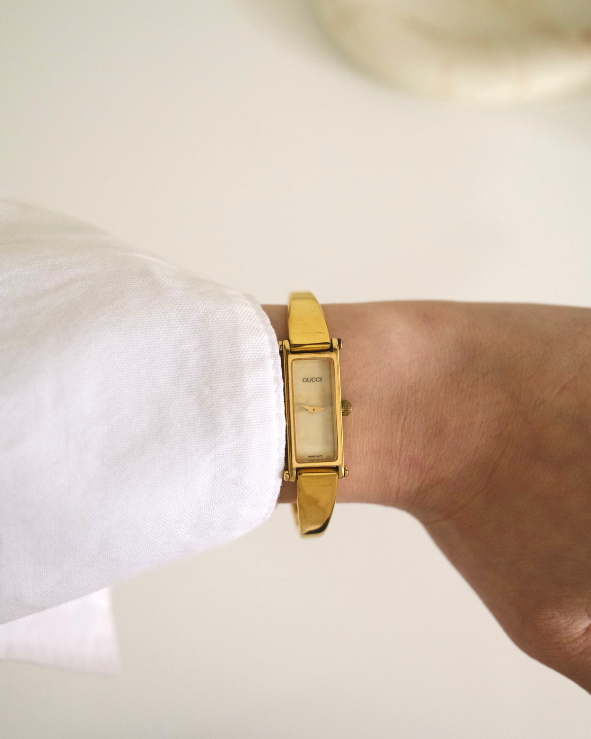 Vintage Gucci 1500L Gold Watch | Mother of Pearl Dial | Elegant Gold Bangle Bracelet | Classic Designer Timepiece
