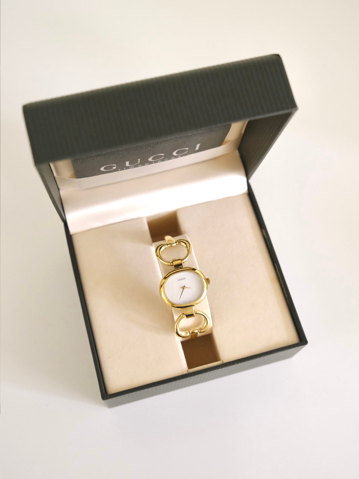 Vintage Gucci 1600L Gold Watch | White Dial | Elegant Gold Bangle Bracelet | Classic Swiss Designer Timepiece