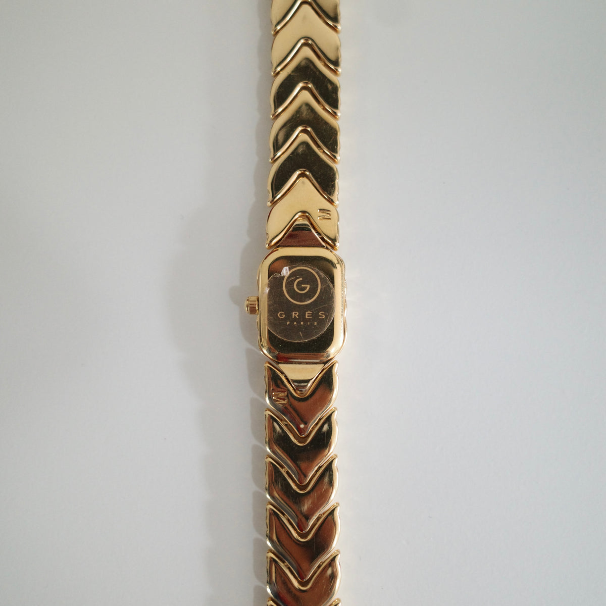 Rare Vintage Grès Gold-Tone Bracelet Watch – Black Dial & Diamond Detail