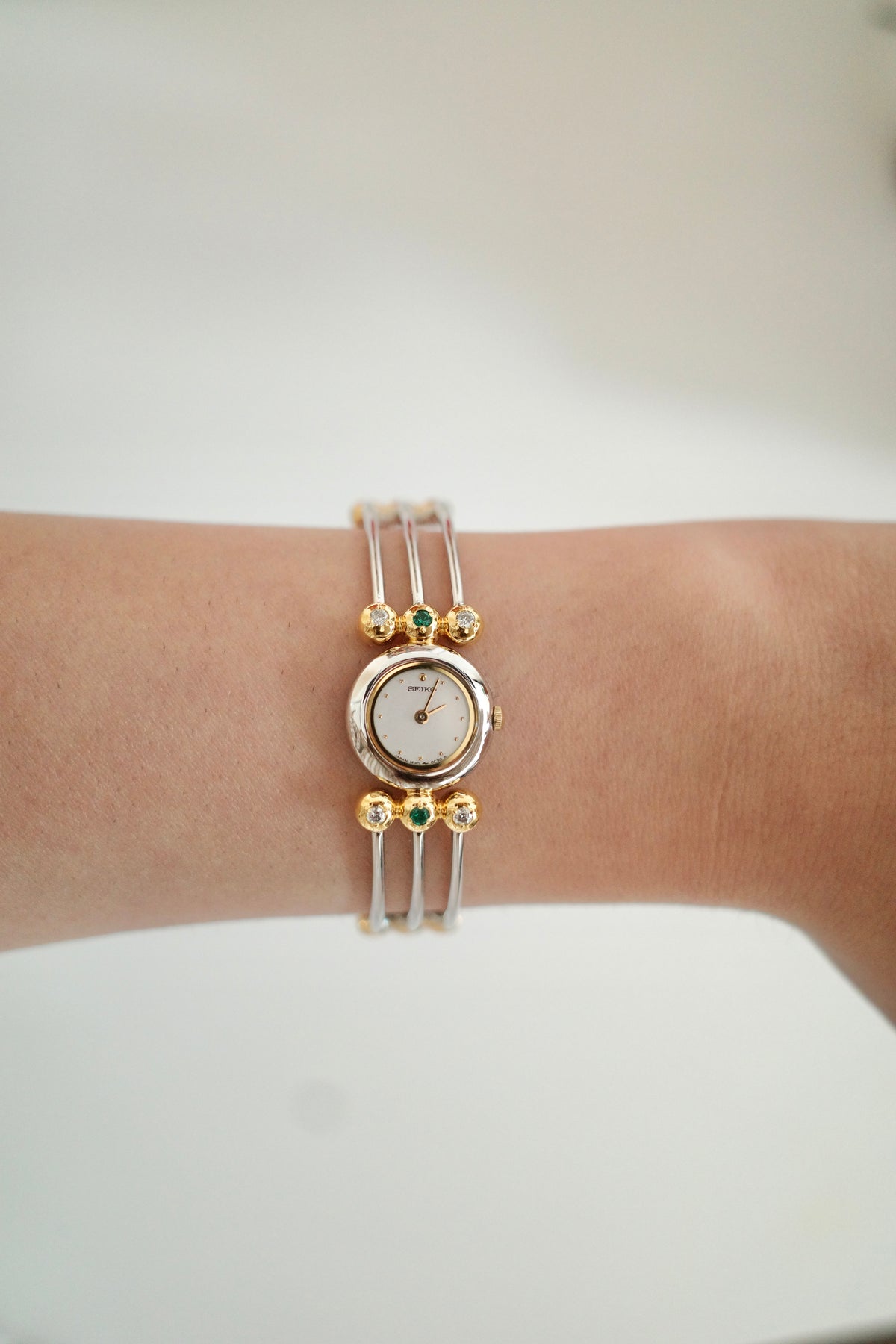 Vintage Seiko Emerald Crystal Bangle Watch | Gold & Silver Two-Tone Women’s Bracelet Watch