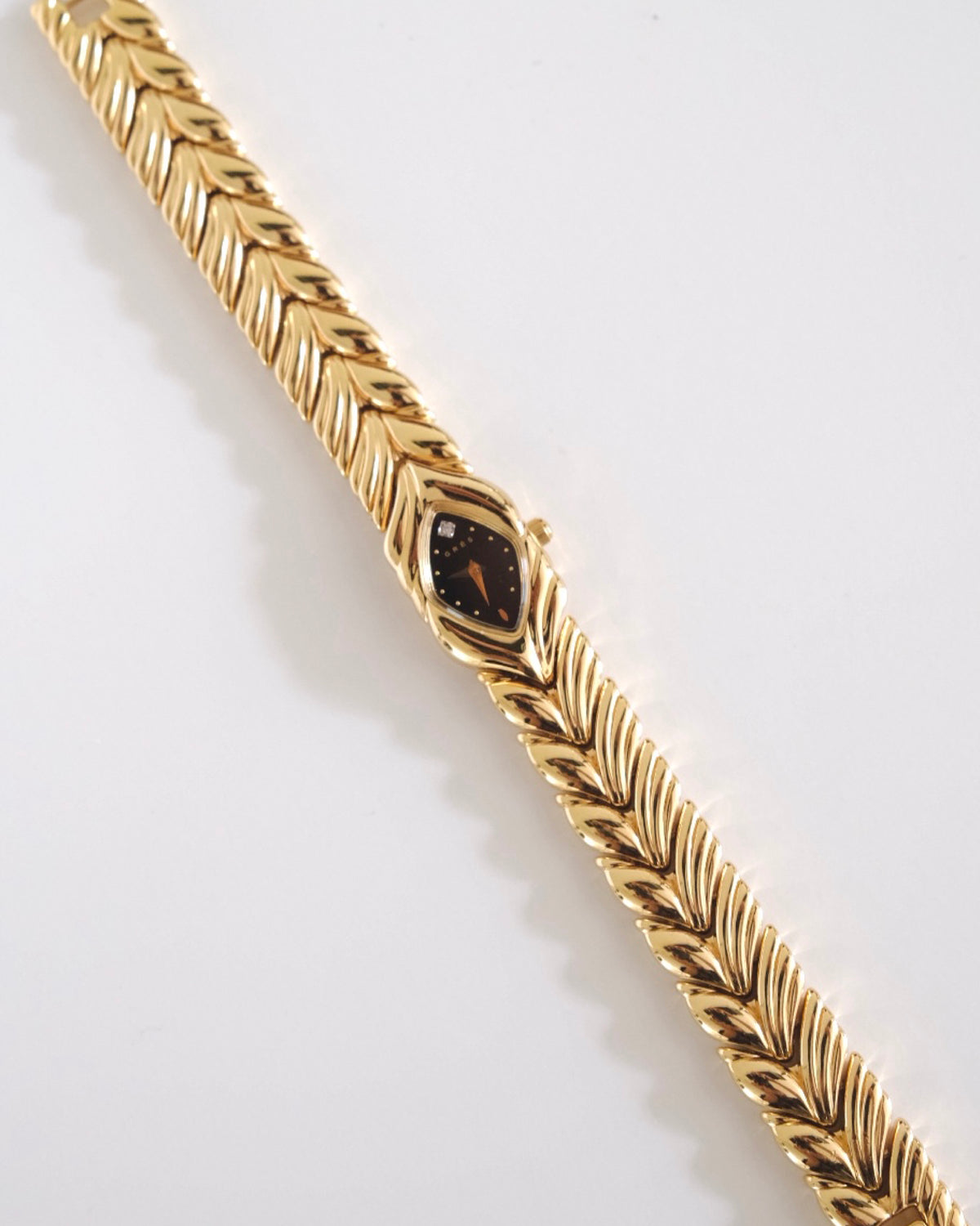 Rare Vintage Grès Gold-Tone Bracelet Watch – Black Dial & Diamond Detail