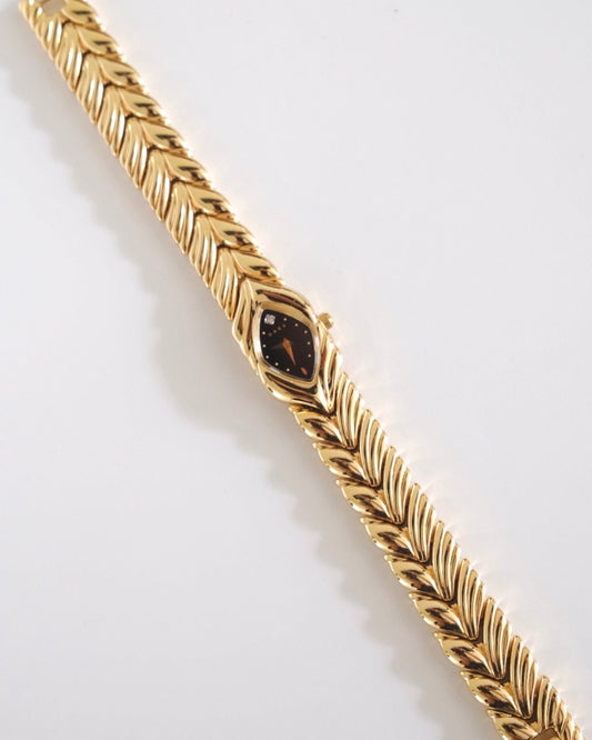 Rare Vintage Grès Gold-Tone Bracelet Watch – Black Dial & Diamond Detail