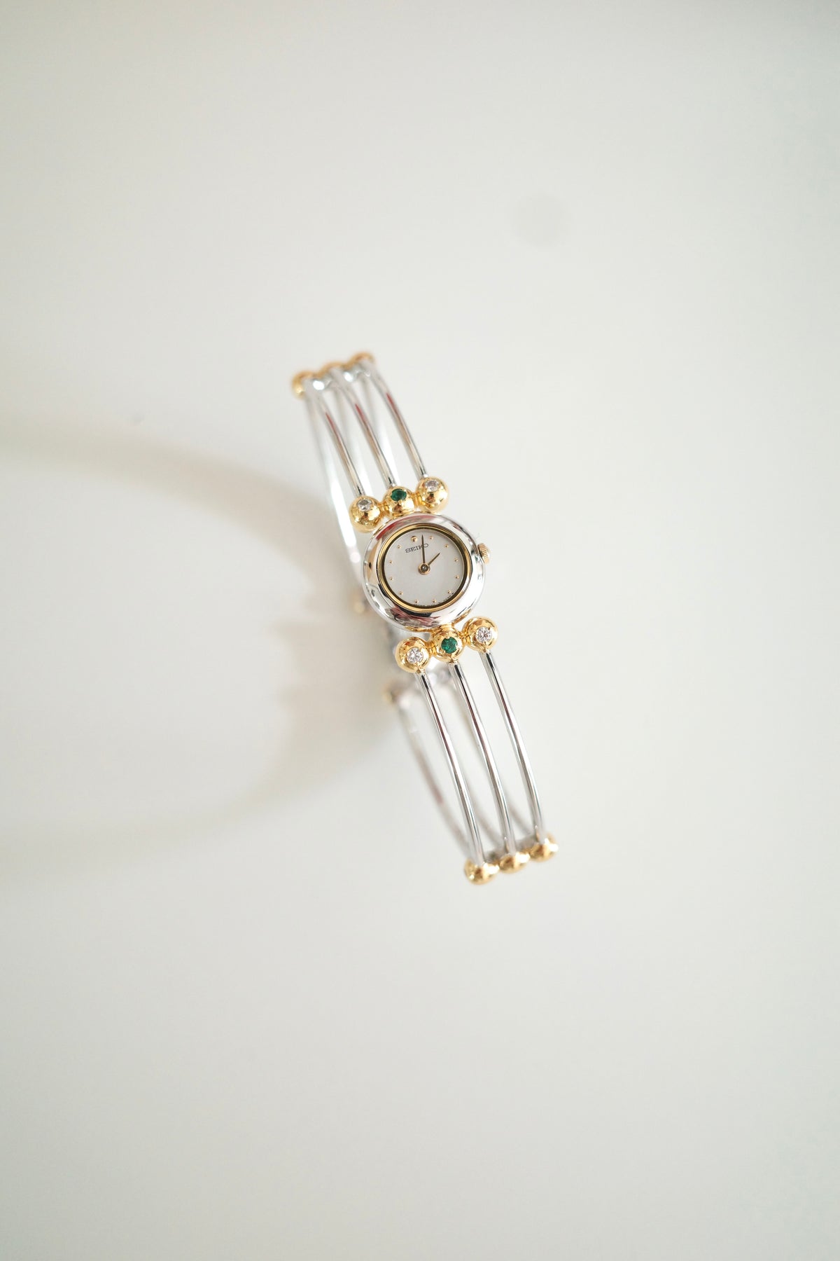 Vintage Seiko Emerald Crystal Bangle Watch | Gold & Silver Two-Tone Women’s Bracelet Watch