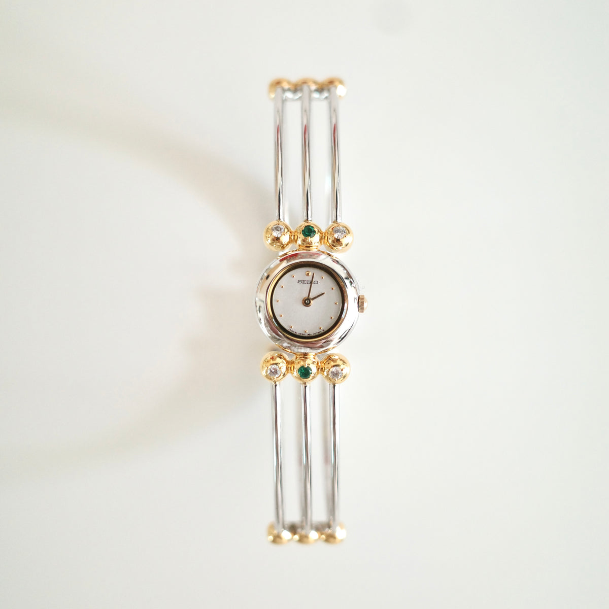 Vintage Seiko Emerald Crystal Bangle Watch | Gold & Silver Two-Tone Women’s Bracelet Watch